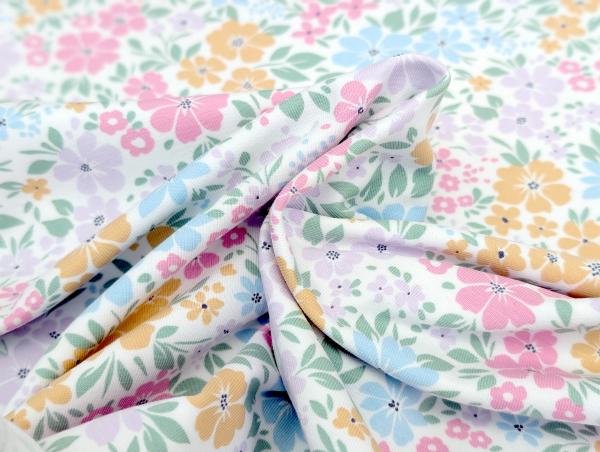 Baumwolljersey Pastell Blumenwiese Cremeweiss